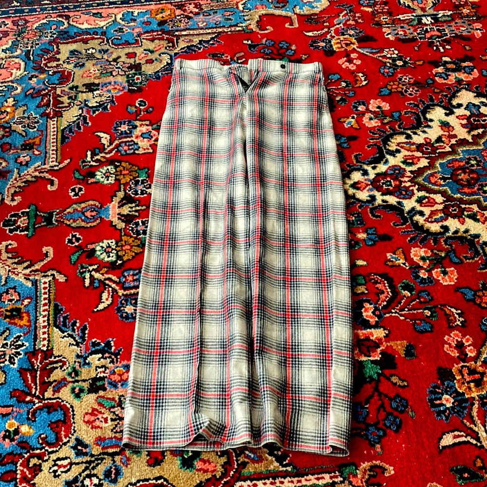 Burberry pants brown, black and red.